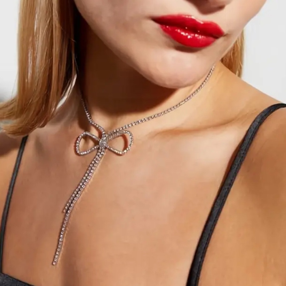 Silver Plated Rhinestone Bow Necklace. New.